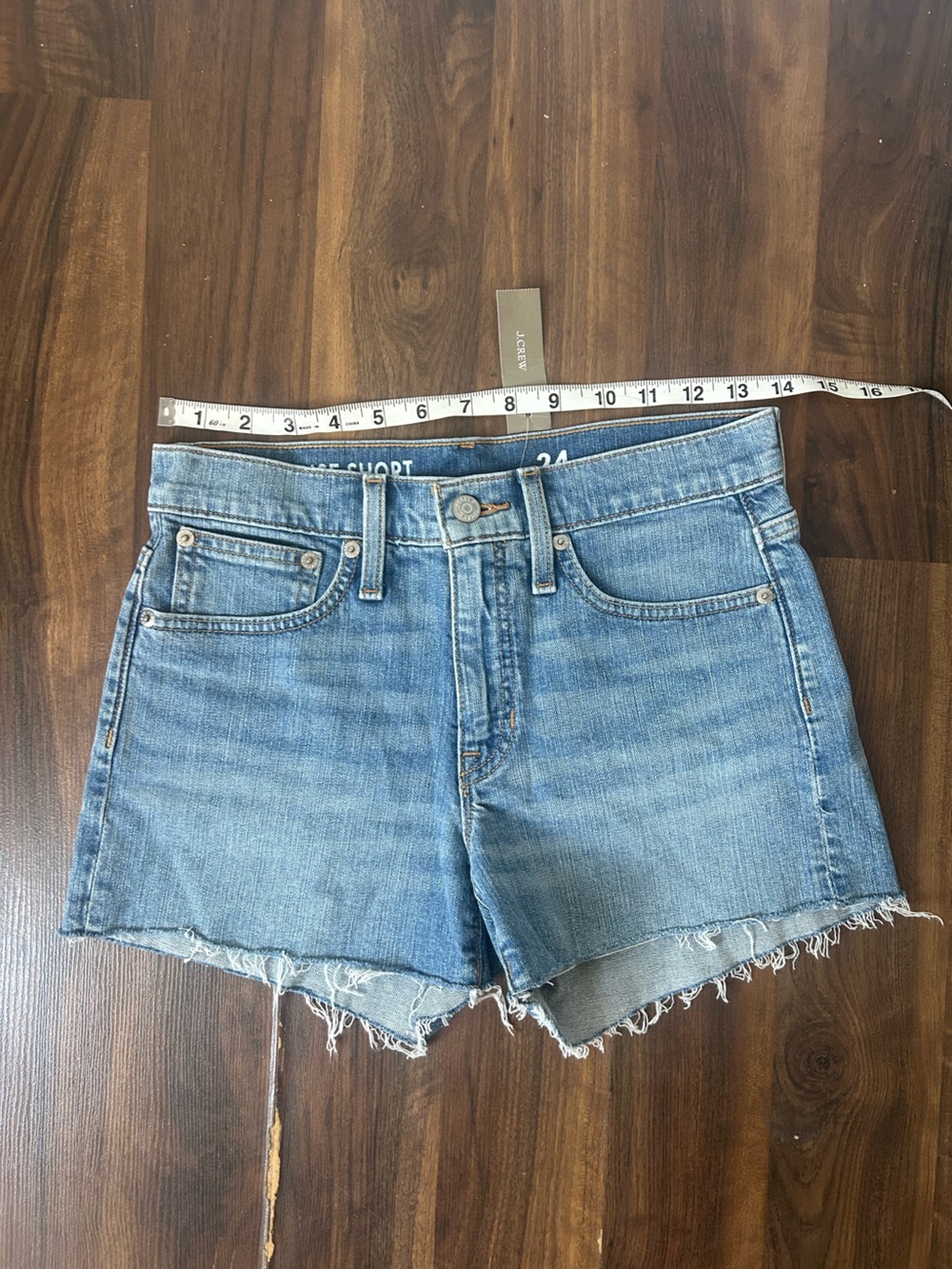 J. Crew Mid Rise Light Wash Raw Hem Denim Shorts | Size 24 - Picture 6 of 7